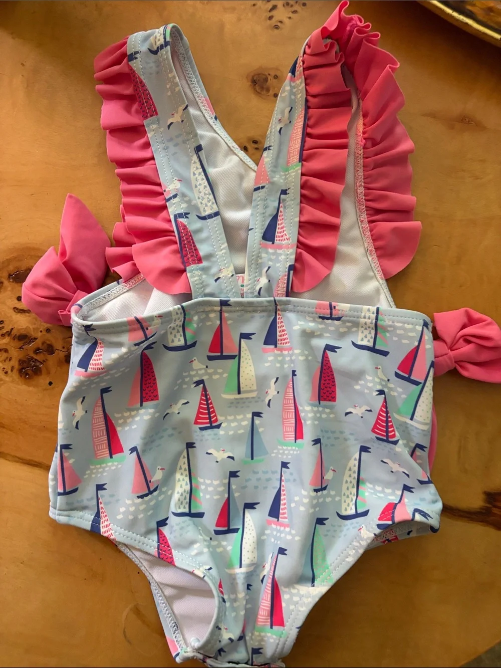 Stitchy Fish Sailboat One-Piece Swimsuit with Pink Ruffle & Bow